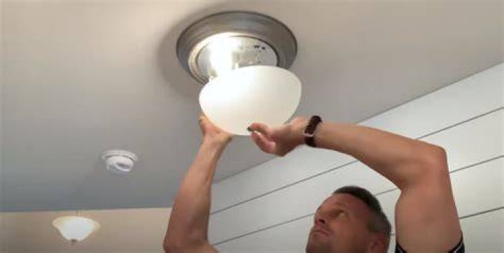 How do I change the bulb in my security light?