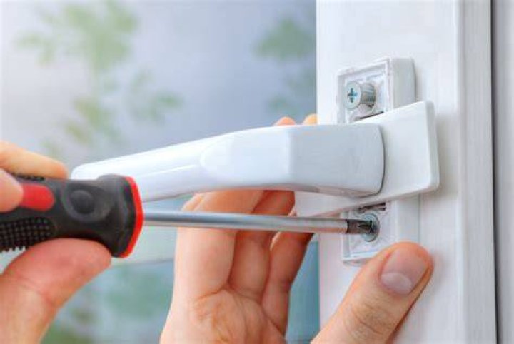 How do you tighten UPVC window handles?
