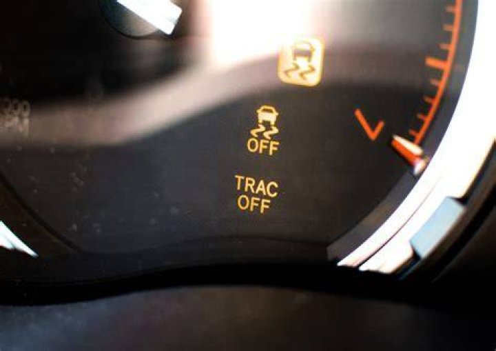 How do you turn the Trac Off light on a Toyota Camry?